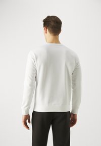 Champion ICONS CREWNECK SMALL LOGO - Felpa - white
