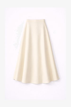 Kreemjas A-lõikeline seelik, mis on tehtud ühtlasest kangast, varustatud istuva vöökohaga ja voolava servaga, mis õrnalt laiub.