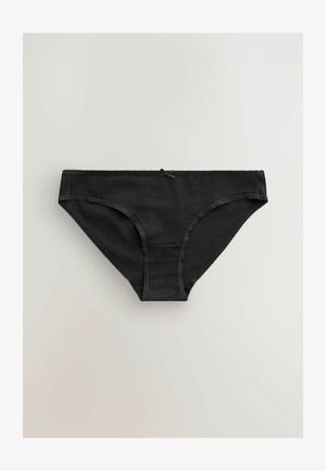 Sorte stof panties med en sømløs design, der har bølgede kanter og en lille sløjfe accentueret i midten foran. Blød, glat tekstur.