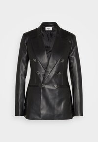 Blazer noir en cuir à double boutonnage avec des revers pointus, des boutons métalliques et des coutures blanches. Coupe ajustée texturée avec deux poches avant.