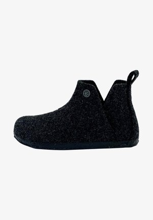 Black felt ankle boot with a textured surface and a looped pull tab at the back, featuring a flat rubber sole.