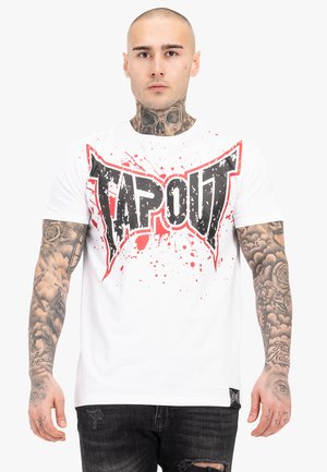 Hvid bomulds T-shirt med et iøjnefaldende sort og rødt "TAPOUT" grafisk design med splatter. Kortærmet og med rund halsudskæring.