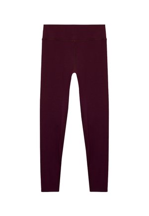 Bordeaux leggings van rekbaar materiaal, met een hoge tailleband en een gladde textuur, in een nauwsluitend ontwerp en zonder zichtbare naden.