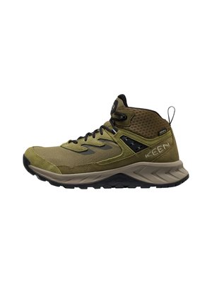 Olive green and black mid-top hiking shoe with textured mesh upper, cushioned beige sole, and pull tab on the heel.