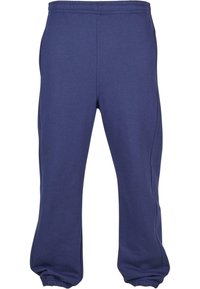 Navyblaue Sweatpants aus weichem Baumwoll-Mix-Stoff, ausgestattet mit einem elastischen Bund und Bündchen sowie seitlichen Taschen für Funktionalität.
