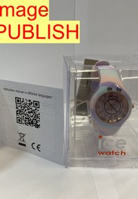 Saldēšanas pulkstenis ar pasteļrozā un lila silikona siksnu, apaļu rāmi un caurspīdīgu plastmasas korpusu. Iekļauta QR kods un lietošanas instrukcija.