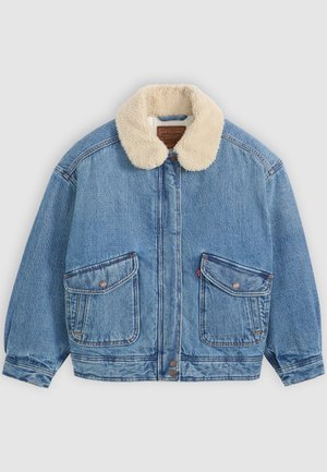 Denim jacket in light blue with a beige, sherpa-lined collar. Features two large front pockets and visible stitching details.