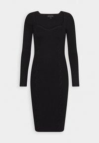 Robe longue noire côtelée à manches longues, avec un décolleté carré, une coupe ajustée et un motif de nœud décoratif le long des côtés.