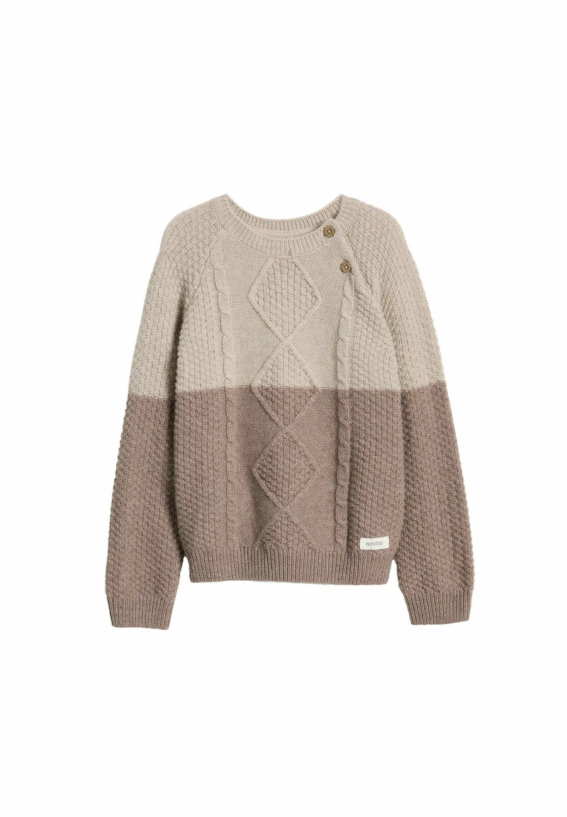 Stickad tröja i beige och taupe med texturerade mönster, kabeldesign, rund hals och två dekorativa knappar på vänster axel.
