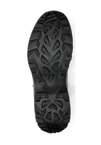 Suela de zapato de goma negra con surcos profundos y un patrón geométrico. Detalles notables incluyen puntos de tracción elevados y áreas texturizadas para un mejor agarre.