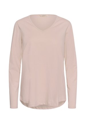 Svetlo bež ženska majica z dolgimi rokavi in V-izrezom, z ukrivljenim robom in preprostim enobarvnim dizajnom.