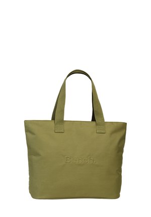 Olijfgroen tote bag van stof, met twee stevige handvatten en een geperst "Bench."-logo aan de voorkant. Eenvoudig rechthoekig ontwerp.