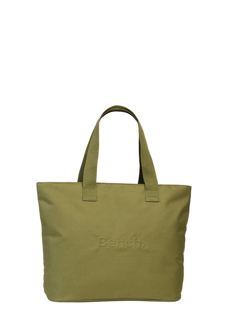 Olijfgroen tote bag van stof, met twee stevige handvatten en een geperst "Bench."-logo aan de voorkant. Eenvoudig rechthoekig ontwerp.