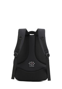 Black ergonomic backpack with padded mesh back, adjustable straps, and a branded patch featuring arrows. Smooth texture and contoured shape.
