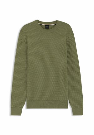 Olivenfarvet tekstureret sweater med rund hals, lange ærmer og ribbede manchetter. Har et vaffelmønstret design hele vejen igennem.