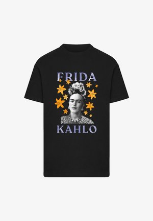 Black cotton t-shirt featuring a graphic print of Frida Kahlo in black and white, surrounded by orange flowers and purple text.