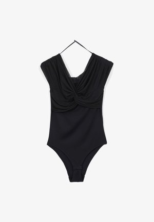 Costume intero nero con design anteriore annodato, spalline larghe e schiena a V profonda. Tessuto liscio con finitura opaca.