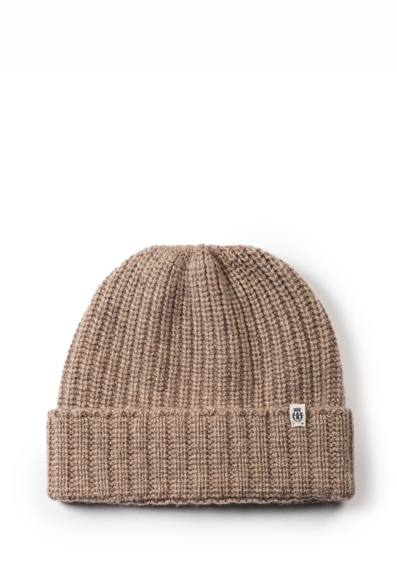 Brown knitted beanie hat with a ribbed texture and a folded cuff, featuring a small logo label on the front right side.