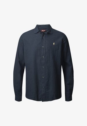 Dunkelblaues Langarmhemd aus Leinen; mit Knopfleiste, spitzem Kragen und aufgesticktem Logo in Gold auf der Brust.