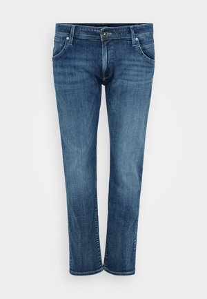 Blue denim jeans with a straight leg design, featuring front pockets, a zip fly, and subtle fading. Classic style with a medium wash finish.