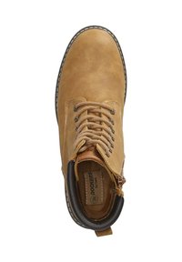 Tan leather ankle boot featuring a rounded toe, six eyelets, beige laces, and contrasting stitching. Boot has a soft lining and rubber sole.