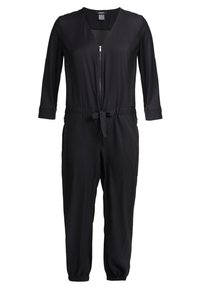 Combinaison noire à manches longues, décolleté en V, fermeture éclair à l'avant, taille à nouer et poignets élastiqués. Fabriquée à partir d'un tissu lisse et léger.