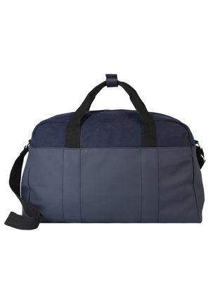 Dunkelblauer Dufflebag aus robustem Stoff, mit zwei schwarzen Griffen, einem verstellbaren Tragegurt und zwei Seitennähten für zusätzliche Stabilität.