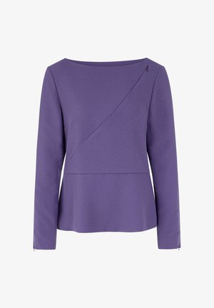 Purple long-sleeve top with a round neckline, diagonal front seam detail, textured fabric, and subtle shimmer. Side openings enhance comfort.