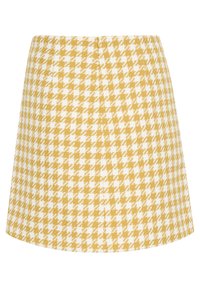 Krilo s rumenim in belem houndstooth vzorcem, ki ima široko obliko in strukturirano tkanino. Ima zadnji šiv za oblikovanje.