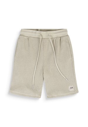 Beige Netzshorts mit verstellbarem Kordelzugbund und kleinem Logo-Patch am linken Bein, flach auf weißem Hintergrund dargestellt.