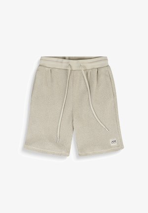 Pantaloncini beige in mesh con vita regolabile tramite coulisse e piccolo patch con logo sulla gamba sinistra, mostrati distesi su sfondo bianco.