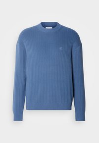 - Sweter