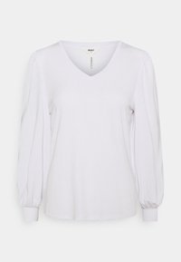 Vit långärmad topp i bomullsblandning, med V-ringning och puffärmar med åtsittande manschetter. Slät textur och avslappnad silhuett.