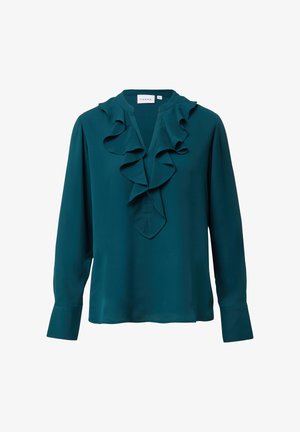 Turkusowa bluzka z długim rękawem z falbaniastym dekoltem, wykonana z gładkiego materiału. Posiada dopasowane mankiety i lekko obniżony dół. Widoczna etykieta marki.