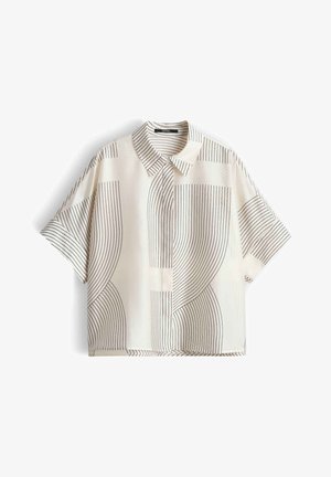 Weißes kurzärmliges Hemd mit schwarzen, vertikalen und gebogenen dünnen Streifen, die geometrische Muster bilden.