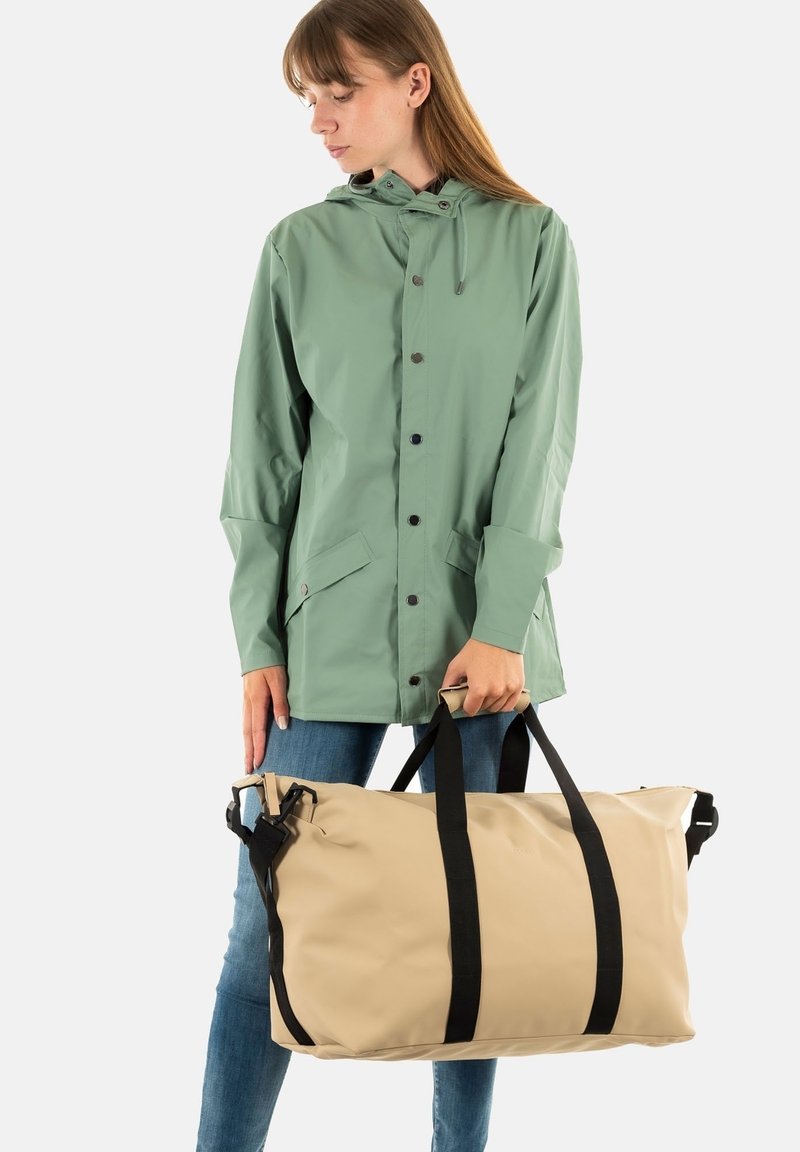 Rains HILO UNISEX - Weekend bag - beige