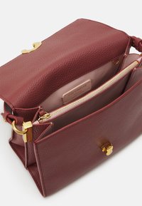 Coccinelle BINXIE - Borsa a mano - brown