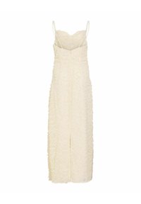 Longue robe ivoire sans manches avec fines bretelles, tissu texturé, corsage ajusté et fente centrale à l'avant.