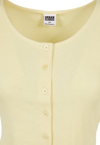 Top sans manches côtelé jaune clair avec encolure ronde et cinq petits boutons à l'avant, étiquette Urban Classics, taille XS.