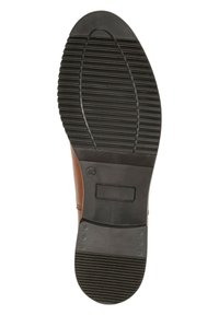 Suela de calzado de goma negra con ranuras horizontales y un borde redondeado, con una parte superior de cuero marrón y el tamaño marcado como 40.