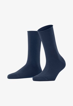 Calcetines de algodón azul marino con una textura suave, de altura media hasta la pantorrilla, con puntera y talón reforzados, que presentan un discreto detalle de logo azul.
