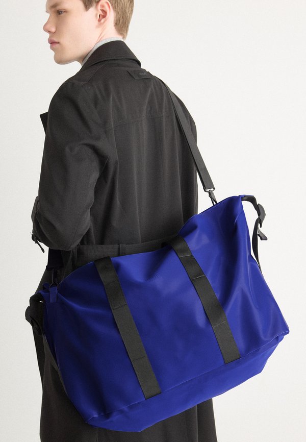 HILO BAG UNISEX - Holdall - parade4