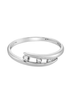 Silver open bangle bracelet with three round clear gemstones set between overlapping curved ends.