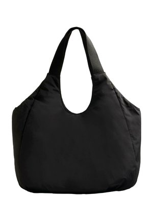 Black oversized tote bag with a smooth, matte finish, wide shoulder strap, and rounded opening for easy access.