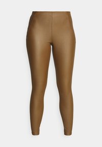 Leggings marroni aderenti, realizzati in un materiale liscio ed elastico con cuciture laterali. Design a vita alta e senza motivi o accenti visibili.