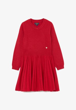 Vestido rojo con parte superior de punto, falda plisada y un pequeño acento de corazón sobre la pretina. Textura suave y mangas largas.