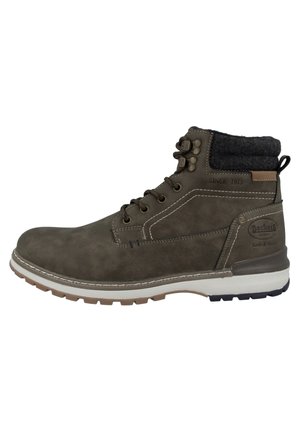 Brown suede ankle boot with a sturdy rubber sole, cushioned collar, and metal lace hooks. Features white stitching and a contrasting tan accent.