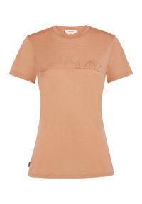 Camiseta de manga corta en color durazno, hecha de material suave, que presenta un gráfico minimalista de camping con una tienda y una fogata bordados en marrón.