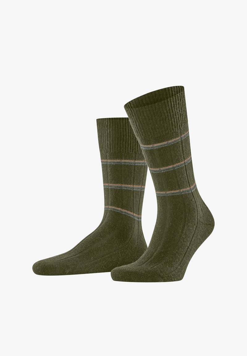 Calze di cotone verde oliva con texture a costine, caratterizzate da due strisce orizzontali grigie e arancioni vicino alla parte superiore. Design standard alla caviglia.