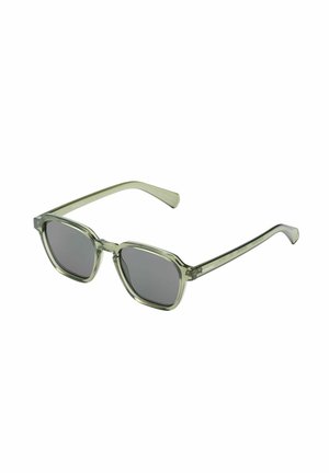 Round sunglasses with a translucent green frame, gray lenses, and angular design; features thick arms with subtle branding on the side.
